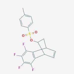 3,4,5,6-tetrafluorotricyclo[6.2.2.0~2,7~]dodeca-2,4,6,11-tetraen-9-yl 4-methylbenzenesulfonate