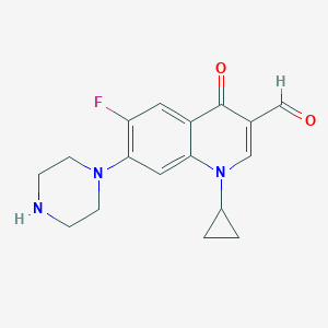 molecular formula C17H18FN3O2 B035156 1-Cyclopropyl-6-fluoro-3-formyl-1,4-dihydro-4-oxo-7-piperazinylquinoline CAS No. 110719-57-8