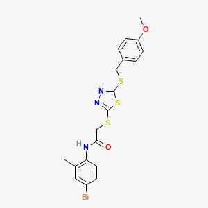 N-(4-bromo-2-methylphenyl)-2-({5-[(4-methoxybenzyl)sulfanyl]-1,3,4-thiadiazol-2-yl}sulfanyl)acetamide