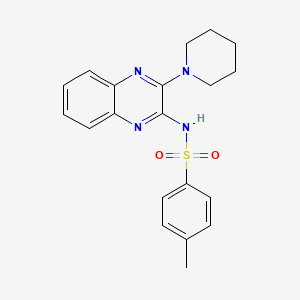 [(4-Methylphenyl)sulfonyl](3-piperidylquinoxalin-2-yl)amine