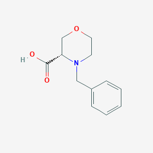 molecular formula C12H15NO3 B035600 (S)-4-Benzyl-3-morpholinecarboxylic acid CAS No. 1235011-96-7