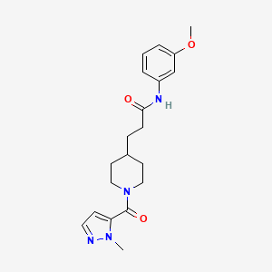 N-(3-methoxyphenyl)-3-[1-(2-methylpyrazole-3-carbonyl)piperidin-4-yl]propanamide