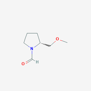 molecular formula C7H13NO2 B037848 (R)-(+)-2-(Methoxymethyl)-1-pyrrolidinecarboxaldehyde CAS No. 121817-71-8