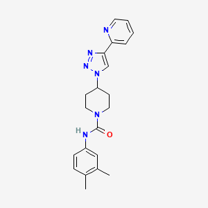 molecular formula C21H24N6O B3812149 N-(3,4-dimethylphenyl)-4-[4-(2-pyridinyl)-1H-1,2,3-triazol-1-yl]-1-piperidinecarboxamide 