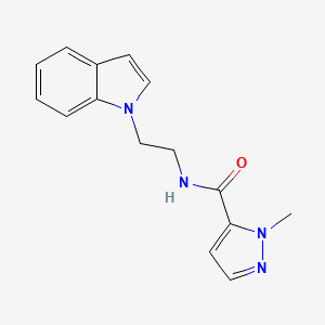 molecular formula C15H16N4O B3813029 N-[2-(1H-indol-1-yl)ethyl]-1-methyl-1H-pyrazole-5-carboxamide 