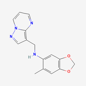 molecular formula C15H14N4O2 B3819134 (6-methyl-1,3-benzodioxol-5-yl)(pyrazolo[1,5-a]pyrimidin-3-ylmethyl)amine 