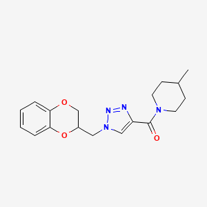 molecular formula C18H22N4O3 B3822863 1-{[1-(2,3-dihydro-1,4-benzodioxin-2-ylmethyl)-1H-1,2,3-triazol-4-yl]carbonyl}-4-methylpiperidine 