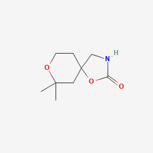 molecular formula C9H15NO3 B3827687 7,7-dimethyl-1,8-dioxa-3-azaspiro[4.5]decan-2-one 