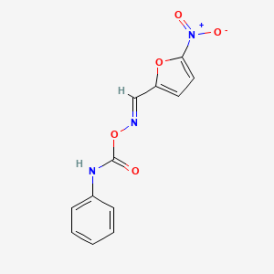 molecular formula C12H9N3O5 B3839052 5-nitro-2-furaldehyde O-(anilinocarbonyl)oxime 