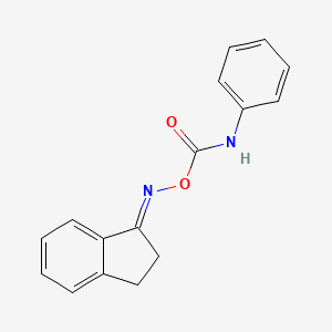 molecular formula C16H14N2O2 B3841227 1-indanone O-(anilinocarbonyl)oxime 