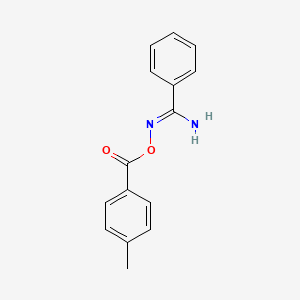 molecular formula C15H14N2O2 B3842952 N'-[(4-methylbenzoyl)oxy]benzenecarboximidamide 