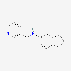 molecular formula C15H16N2 B3854119 2,3-dihydro-1H-inden-5-yl(3-pyridinylmethyl)amine 