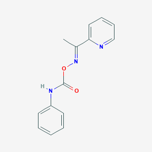 molecular formula C14H13N3O2 B3854724 1-(2-pyridinyl)ethanone O-(anilinocarbonyl)oxime 