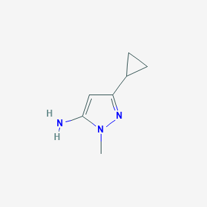 molecular formula C7H11N3 B039020 3-シクロプロピル-1-メチル-1H-ピラゾール-5-アミン CAS No. 118430-74-3