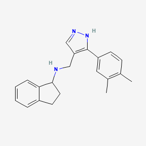 molecular formula C21H23N3 B3957764 2,3-dihydro-1H-inden-1-yl{[3-(3,4-dimethylphenyl)-1H-pyrazol-4-yl]methyl}amine 