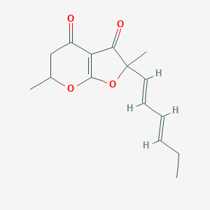 molecular formula C15H18O4 B040198 Cyclogregatin CAS No. 120167-25-1