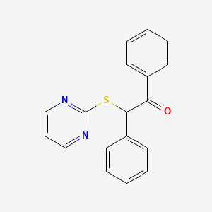 1,2-Diphenyl-2-(pyrimidin-2-ylsulfanyl)ethanone