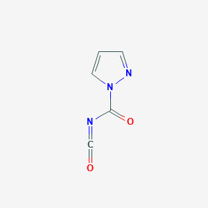 molecular formula C5H3N3O2 B040725 Pyrazole-1-carbonyl isocyanate CAS No. 112423-48-0