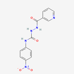 molecular formula C13H11N5O4 B4117044 N-(4-nitrophenyl)-2-(3-pyridinylcarbonyl)hydrazinecarboxamide 