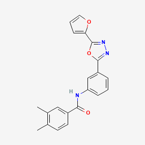 molecular formula C21H17N3O3 B4189684 N-{3-[5-(2-furyl)-1,3,4-oxadiazol-2-yl]phenyl}-3,4-dimethylbenzamide 