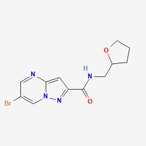 6-bromo-N-(tetrahydrofuran-2-ylmethyl)pyrazolo[1,5-a]pyrimidine-2-carboxamide