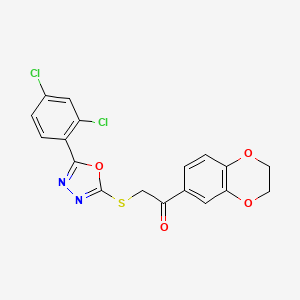 molecular formula C18H12Cl2N2O4S B4219694 2-{[5-(2,4-DICHLOROPHENYL)-1,3,4-OXADIAZOL-2-YL]SULFANYL}-1-(2,3-DIHYDRO-1,4-BENZODIOXIN-6-YL)ETHAN-1-ONE 