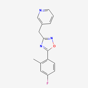 3-{[5-(4-fluoro-2-methylphenyl)-1,2,4-oxadiazol-3-yl]methyl}pyridine trifluoroacetate