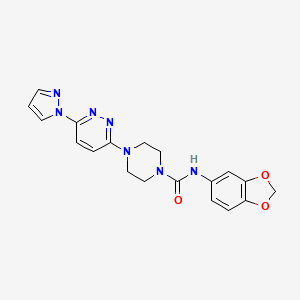 molecular formula C19H19N7O3 B4493265 N-1,3-benzodioxol-5-yl-4-[6-(1H-pyrazol-1-yl)-3-pyridazinyl]-1-piperazinecarboxamide 