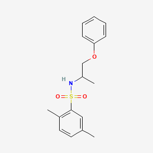 2,5-DIMETHYL-N-(1-PHENOXYPROPAN-2-YL)BENZENE-1-SULFONAMIDE