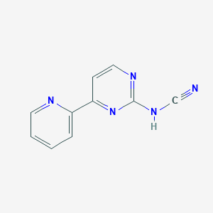 {[4-(PYRIDIN-2-YL)PYRIMIDIN-2-YL]AMINO}FORMONITRILE