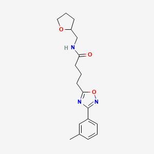 molecular formula C18H23N3O3 B4504542 4-[3-(3-methylphenyl)-1,2,4-oxadiazol-5-yl]-N-(tetrahydro-2-furanylmethyl)butanamide 