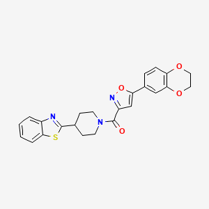 2-{1-[5-(2,3-DIHYDRO-1,4-BENZODIOXIN-6-YL)-1,2-OXAZOLE-3-CARBONYL]PIPERIDIN-4-YL}-1,3-BENZOTHIAZOLE