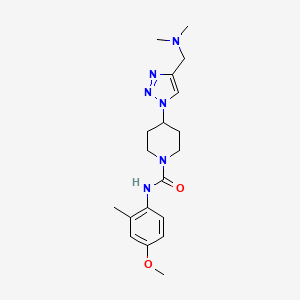 molecular formula C19H28N6O2 B4529385 4-{4-[(dimethylamino)methyl]-1H-1,2,3-triazol-1-yl}-N-(4-methoxy-2-methylphenyl)-1-piperidinecarboxamide trifluoroacetate 