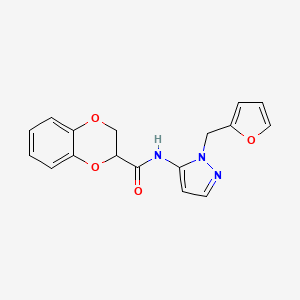 molecular formula C17H15N3O4 B4554545 N-{1-[(furan-2-yl)methyl]-1H-pyrazol-5-yl}-2,3-dihydro-1,4-benzodioxine-2-carboxamide 