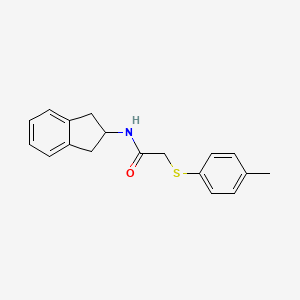 N-(2,3-dihydro-1H-inden-2-yl)-2-[(4-methylphenyl)sulfanyl]acetamide