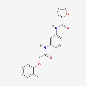 N-{3-[2-(2-METHYLPHENOXY)ACETAMIDO]PHENYL}FURAN-2-CARBOXAMIDE