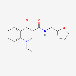 1-ETHYL-4-OXO-N-[(OXOLAN-2-YL)METHYL]-1,4-DIHYDROQUINOLINE-3-CARBOXAMIDE