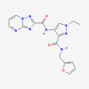 molecular formula C17H16N8O3 B4647419 N-(1-ethyl-3-{[(2-furylmethyl)amino]carbonyl}-1H-pyrazol-4-yl)[1,2,4]triazolo[1,5-a]pyrimidine-2-carboxamide 