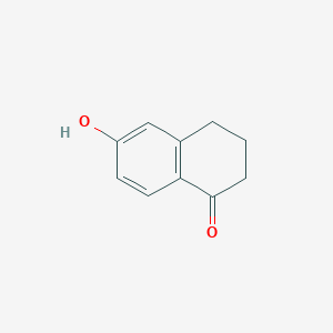 molecular formula C10H10O2 B047845 6-羟基-1-四氢萘酮 CAS No. 3470-50-6
