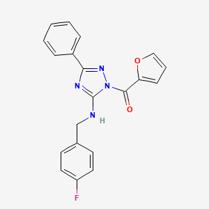 N-[(4-Fluorophenyl)methyl]-1-(furan-2-carbonyl)-3-phenyl-1H-1,2,4-triazol-5-amine