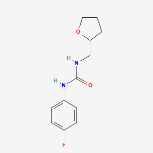 1-(4-Fluorophenyl)-3-(oxolan-2-ylmethyl)urea