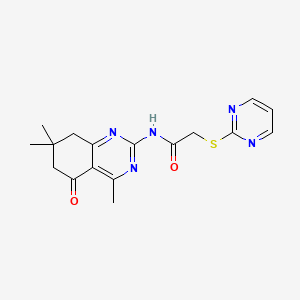 2-(pyrimidin-2-ylsulfanyl)-N-(4,7,7-trimethyl-5-oxo-5,6,7,8-tetrahydroquinazolin-2-yl)acetamide