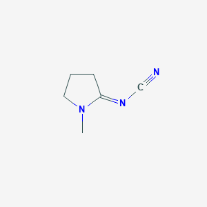 molecular formula C6H9N3 B048730 (1-Methylpyrrolidin-2-ylidene)cyanamide CAS No. 121348-58-1