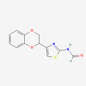 N-[4-(2,3-dihydro-1,4-benzodioxin-2-yl)-1,3-thiazol-2-yl]formamide