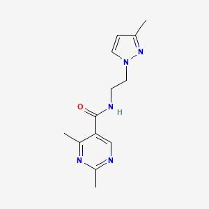 molecular formula C13H17N5O B5101235 2,4-dimethyl-N-[2-(3-methyl-1H-pyrazol-1-yl)ethyl]-5-pyrimidinecarboxamide 