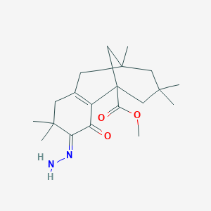 Methyl 4-hydrazono-5,5,9,11,11-pentamethyl-3-oxotricyclo[7.3.1.0~2,7~]tridec-2(7)-ene-1-carboxylate