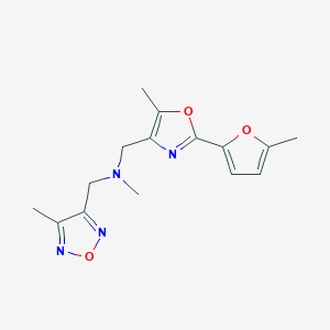 molecular formula C15H18N4O3 B5176070 N-methyl-1-[5-methyl-2-(5-methyl-2-furyl)-1,3-oxazol-4-yl]-N-[(4-methyl-1,2,5-oxadiazol-3-yl)methyl]methanamine 