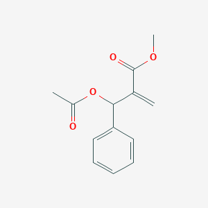 molecular formula C13H14O4 B052297 2-(Acetoxy-phenyl-methyl)-acrylic acid methyl ester CAS No. 124957-36-4