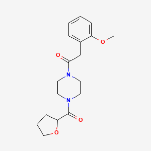 2-(2-METHOXYPHENYL)-1-[4-(TETRAHYDRO-2-FURANYLCARBONYL)PIPERAZINO]-1-ETHANONE