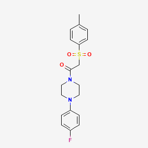 1-[4-(4-FLUOROPHENYL)PIPERAZIN-1-YL]-2-(4-METHYLBENZENESULFONYL)ETHAN-1-ONE